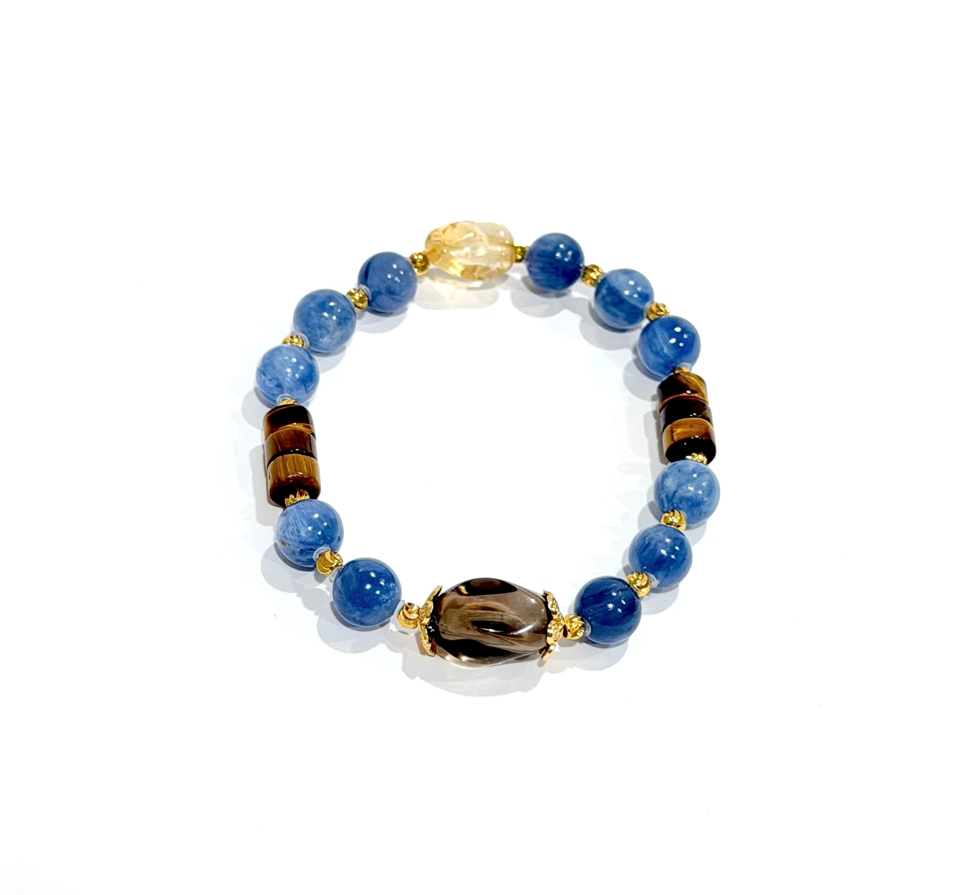 Beaded bracelet with blue, brown, and gold beads on a white background