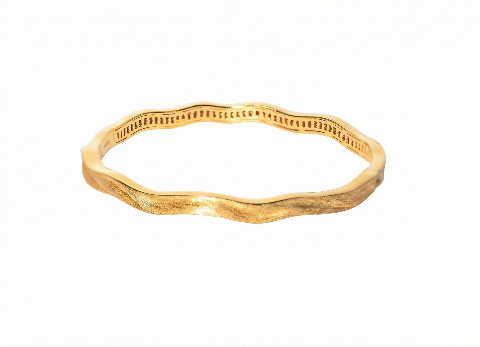 Gold color bracelet on a white background