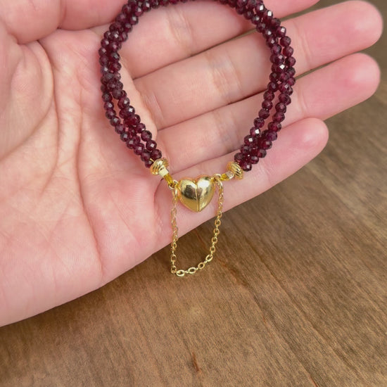 Multi-stand faceted garnet bracelet with heart-shaped magnetic claps